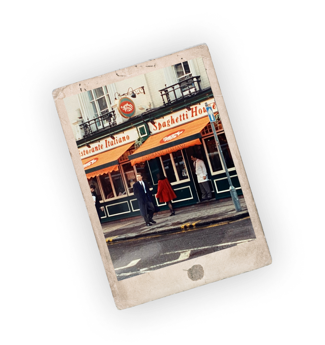 Polaroid photo of a street with an Italian restaurant named 